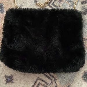 Fur black bag with gold chain